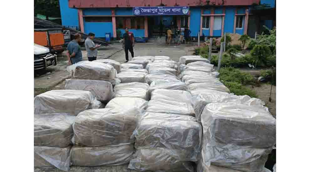 সিলেটে বালুর নিচে মিলল কোটি টাকার শাড়ি